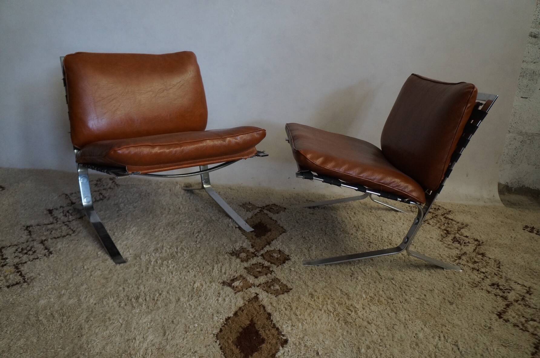 pair of Joker Olivier Morgue armchairs