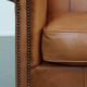 Fauteuil en cuir de vachette couleur cognac