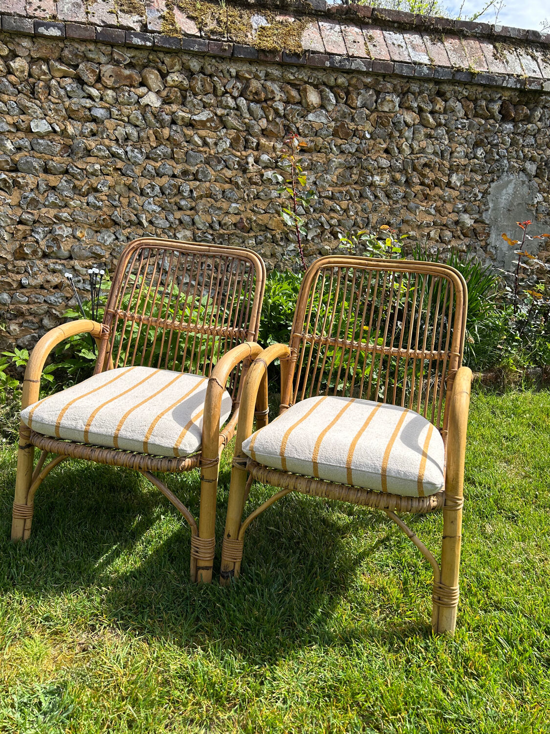 Vintage 1970s rattan armchair pair