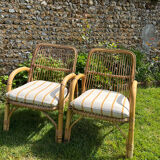 Vintage 1970s rattan armchair pair