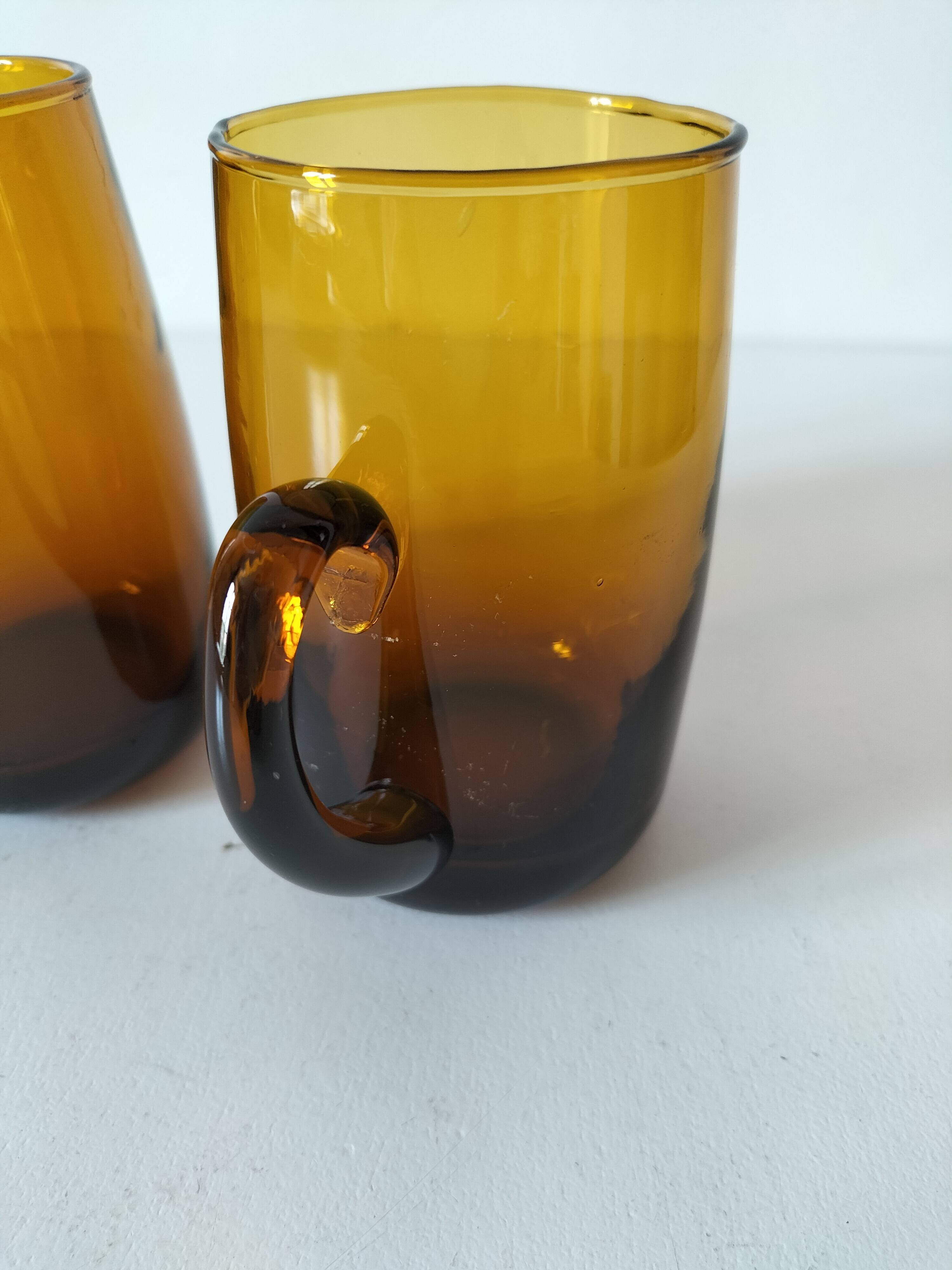 Pair of vintage amber glass tankards