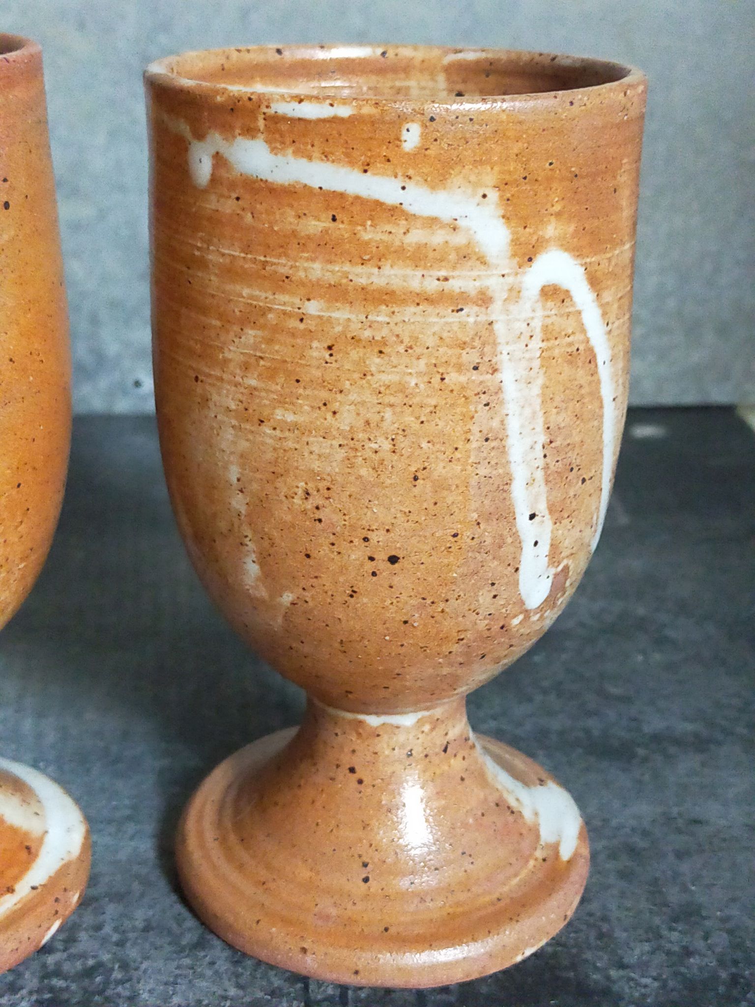 Four potter's mugs turned in vintage light stoneware