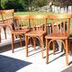 Suite of four foot bistro chairs with hoops / vintage 40s-50s