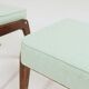 Vintage children's chair stool in pistachio green, mid-century modern design.