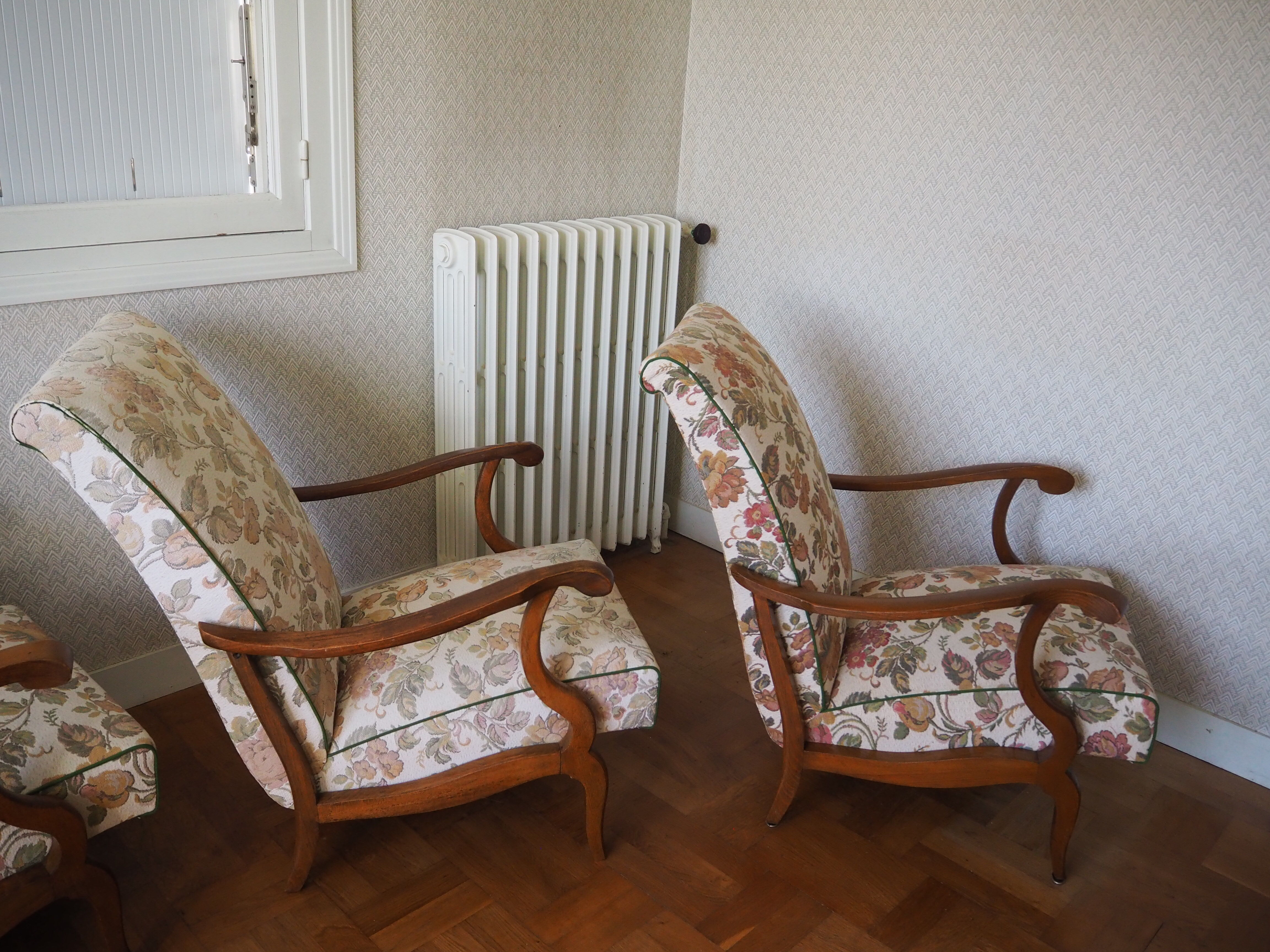 Four 1950s armchairs - wooden armrests
