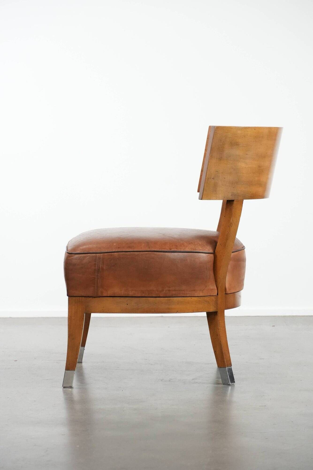 Vintage design armchair / cocktail chair made of sheepskin leather