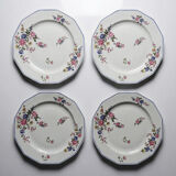 4 flat plates by Bernardaud, Limoges porcelain, floral decoration from the 1920s to 1950s.