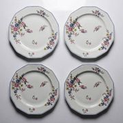 4 flat plates by Bernardaud, Limoges porcelain, floral decoration from the 1920s to 1950s.