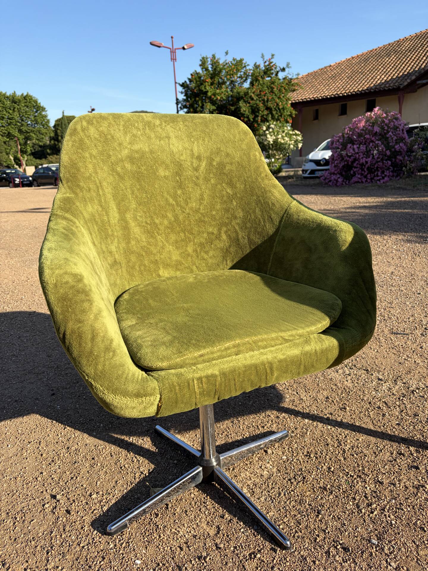 Vintage 1960s Lubke green velvet swivel armchair pair.