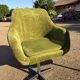 Vintage 1960s Lubke green velvet swivel armchair pair.