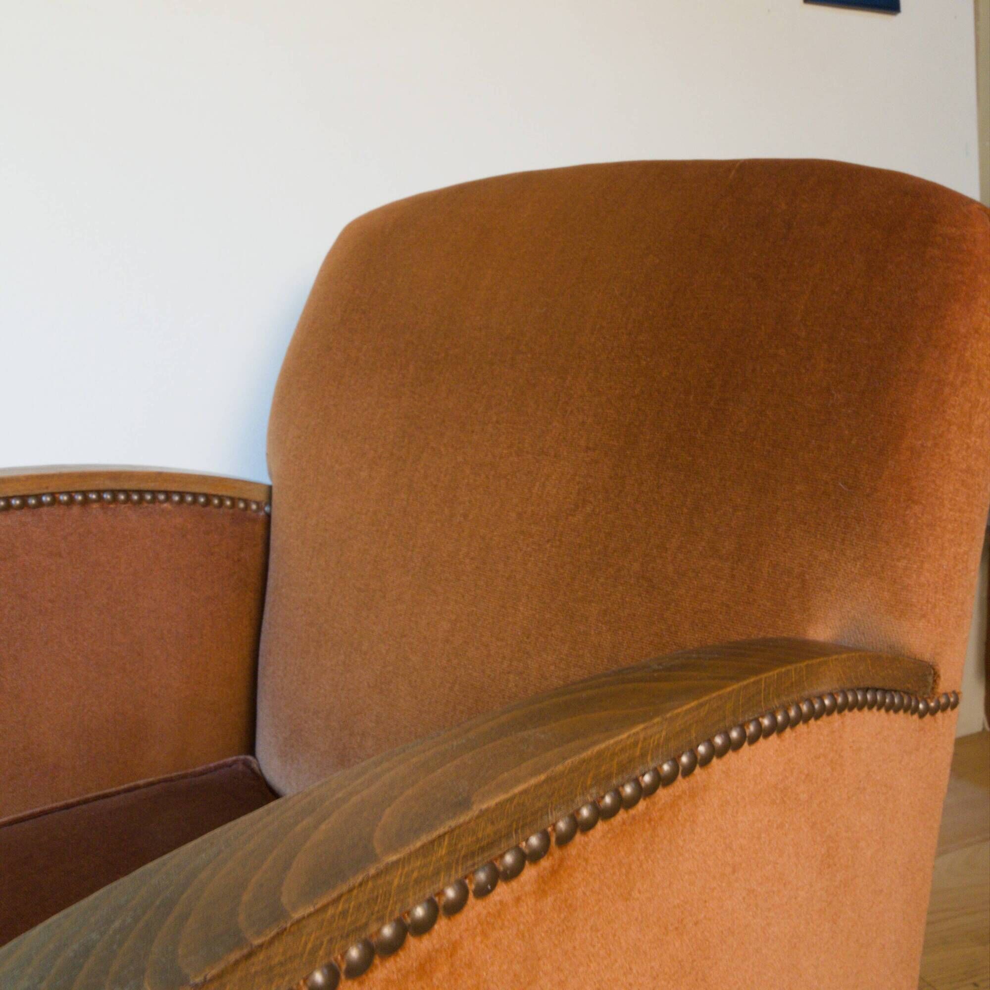 Art Deco club armchair in wood and rust brown velvet, circa 1930.