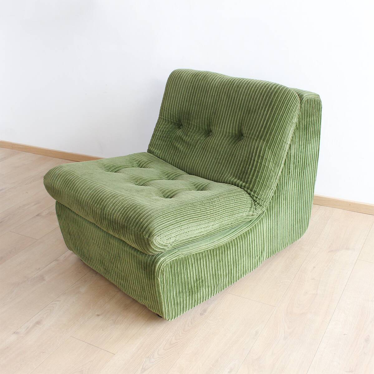 Modular vintage sofa with green cord upholstery