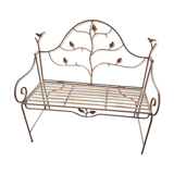 Wrought iron garden bench with birds