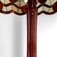 Art Deco floor lamp in carved walnut, stained glass shade, France, c. 1920