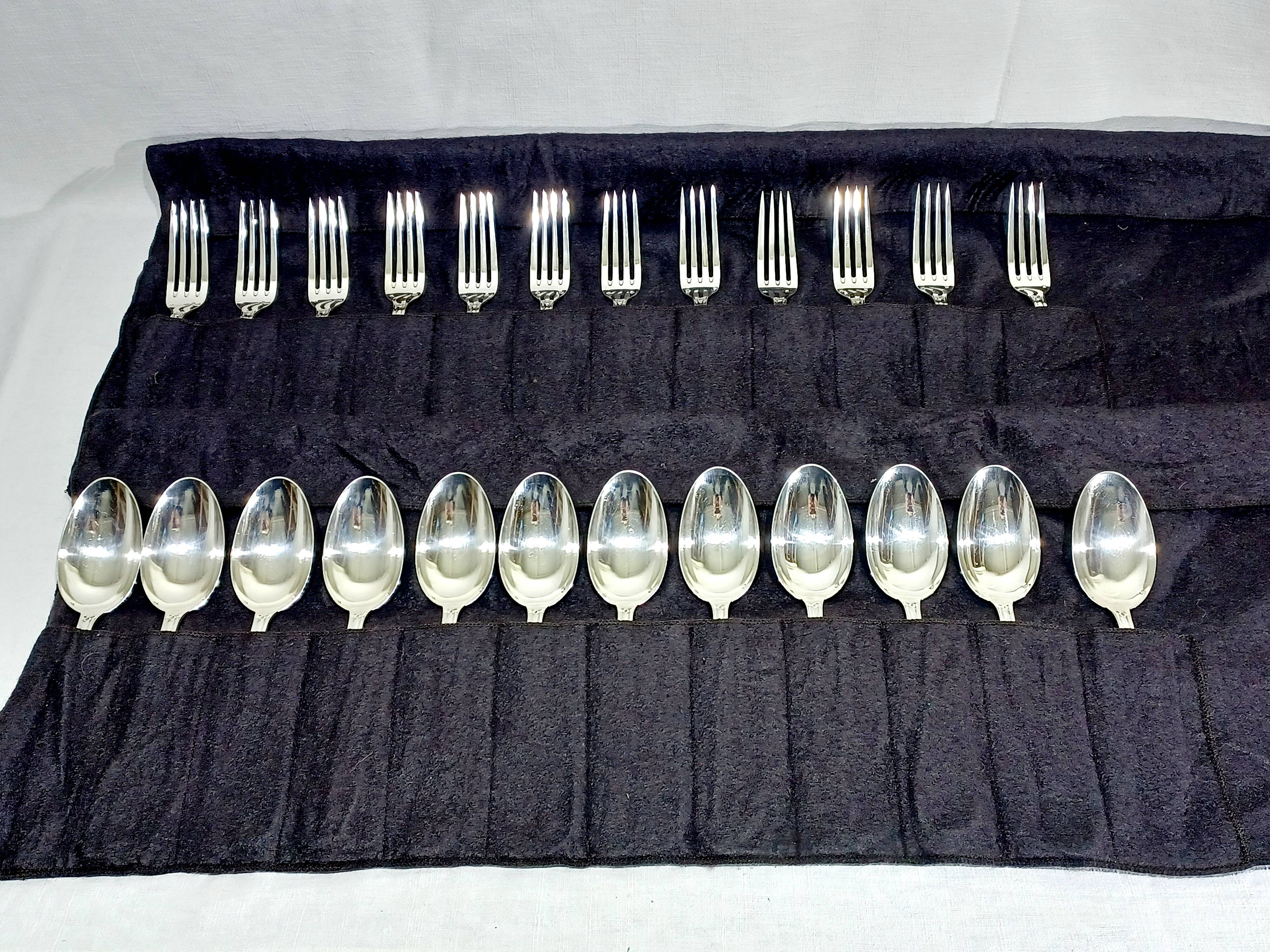 12 Louis XIV style silver cutlery sets