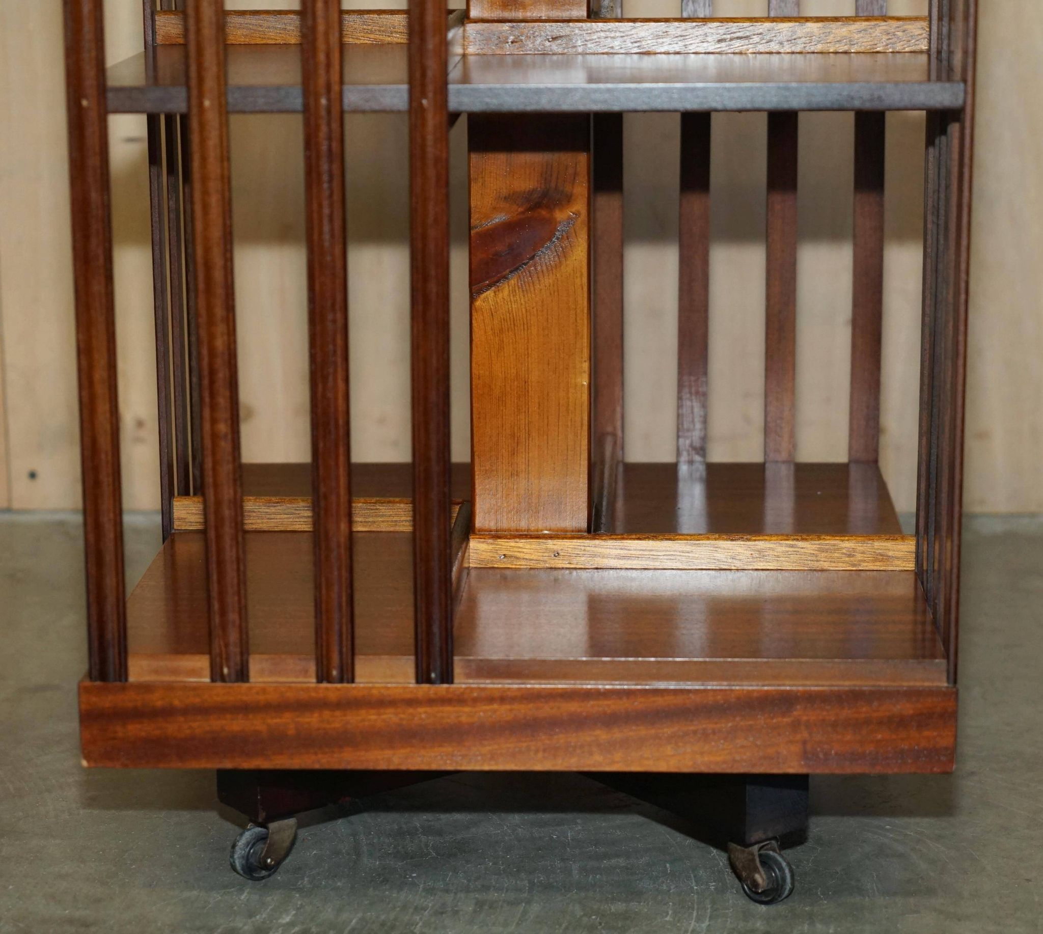 Sheraton Revival rotating library table in walnut and satin wood.