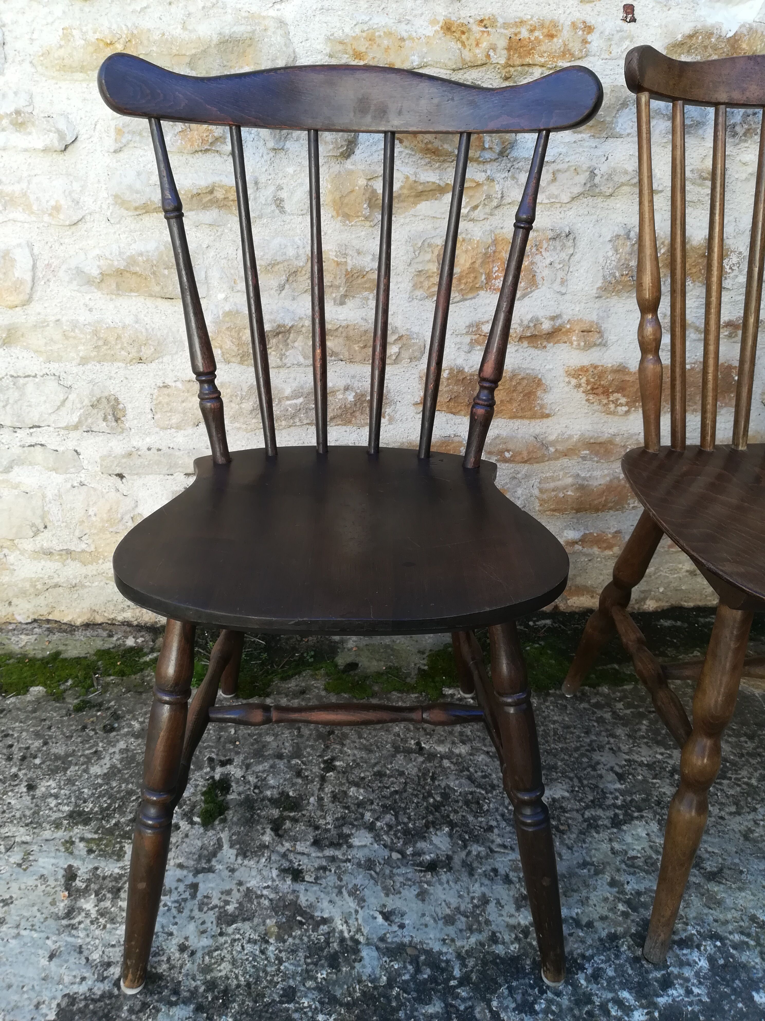Eight mismatched bistro chairs