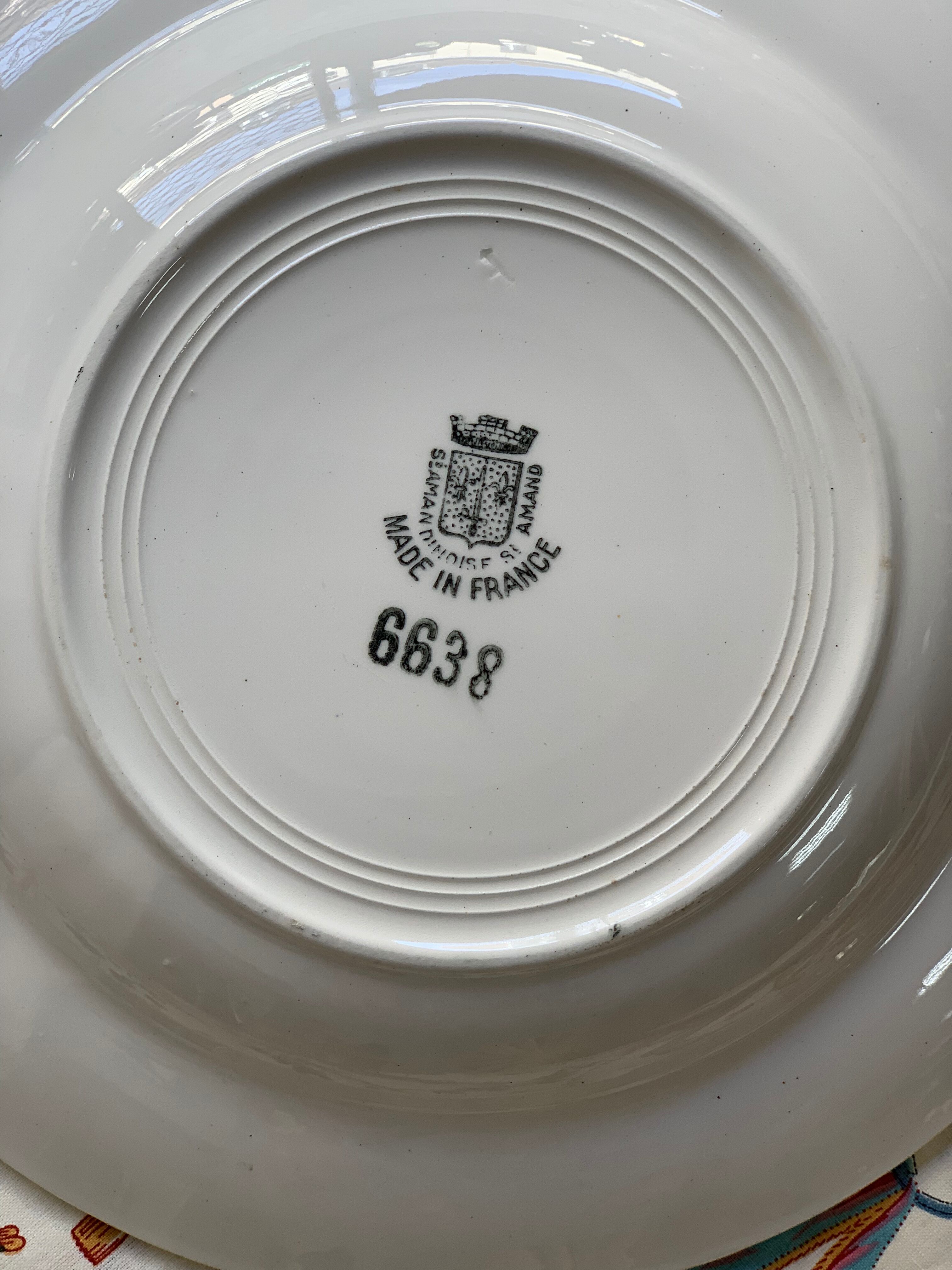 6 hollow earthenware plates, L'Amandinoise