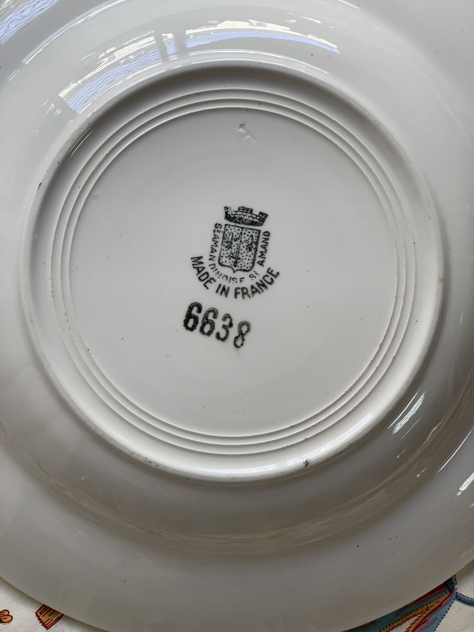 6 hollow earthenware plates, L'Amandinoise