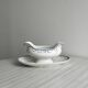 Antique porcelain sauceboat with tray