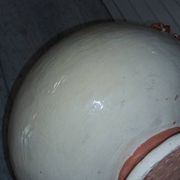 Large vase with relief plant decoration, raw art.