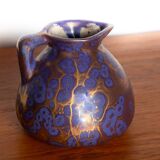 Art Nouveau vase in iridescent purple glazed ceramic by Léon Pointu 1910.