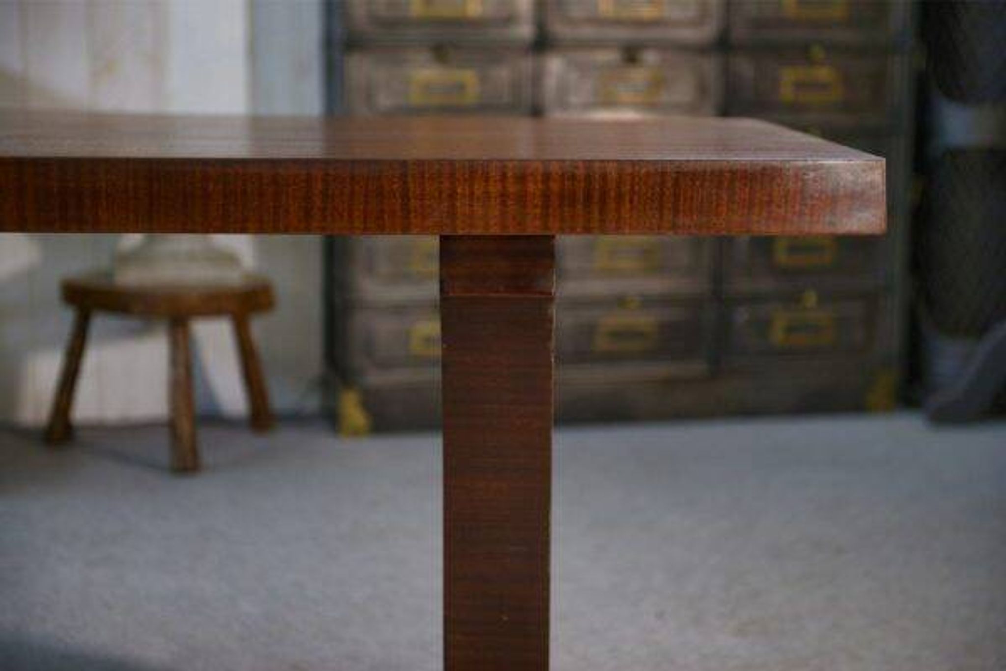 Art Deco mahogany veneer table in the style of Jules Leleu, 1930s