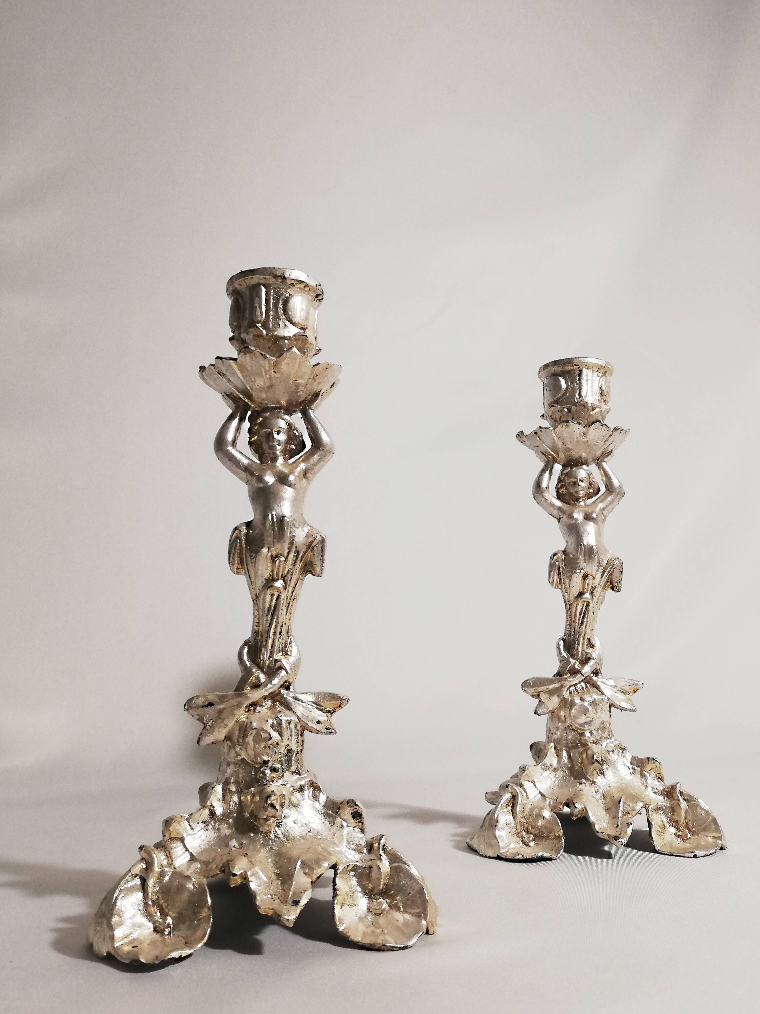 Pair of candlesticks restored to silver leaf