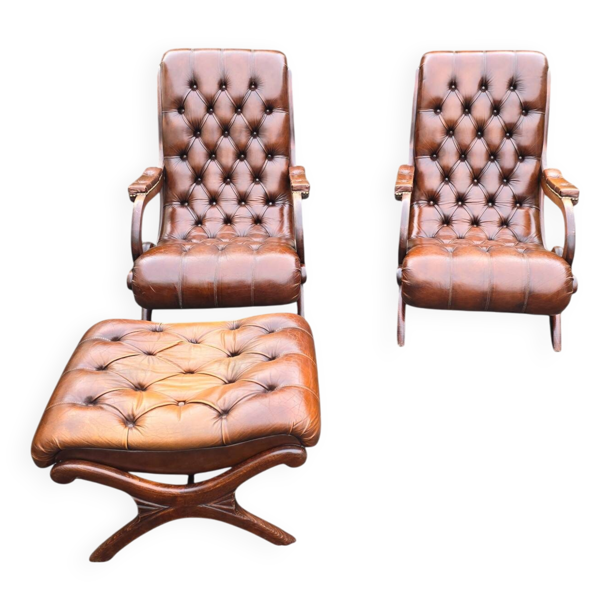 Pair of leather Chesterfields and footstools