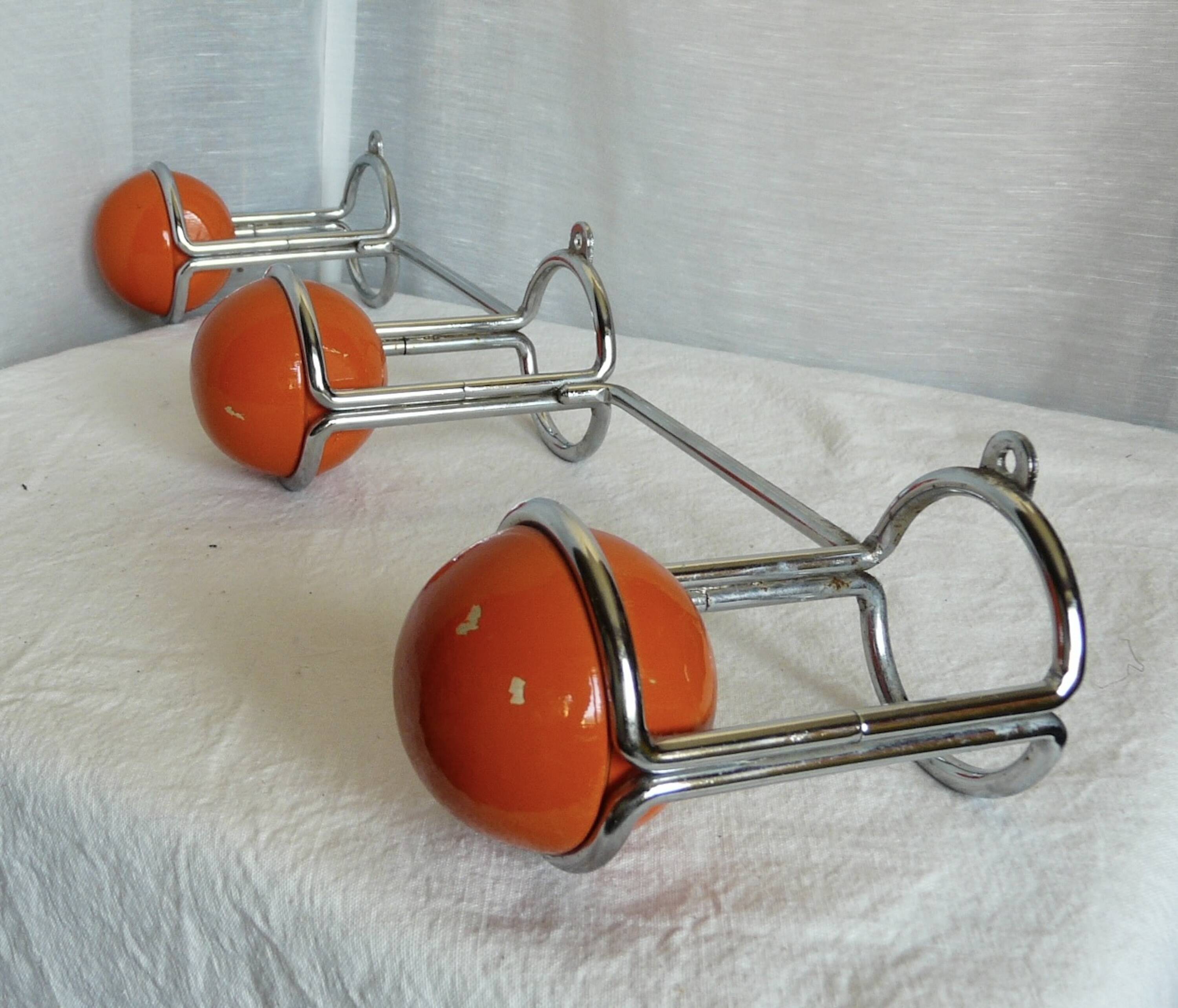 Vintage 1970s orange and chrome coat rack