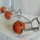Vintage 1970s orange and chrome coat rack