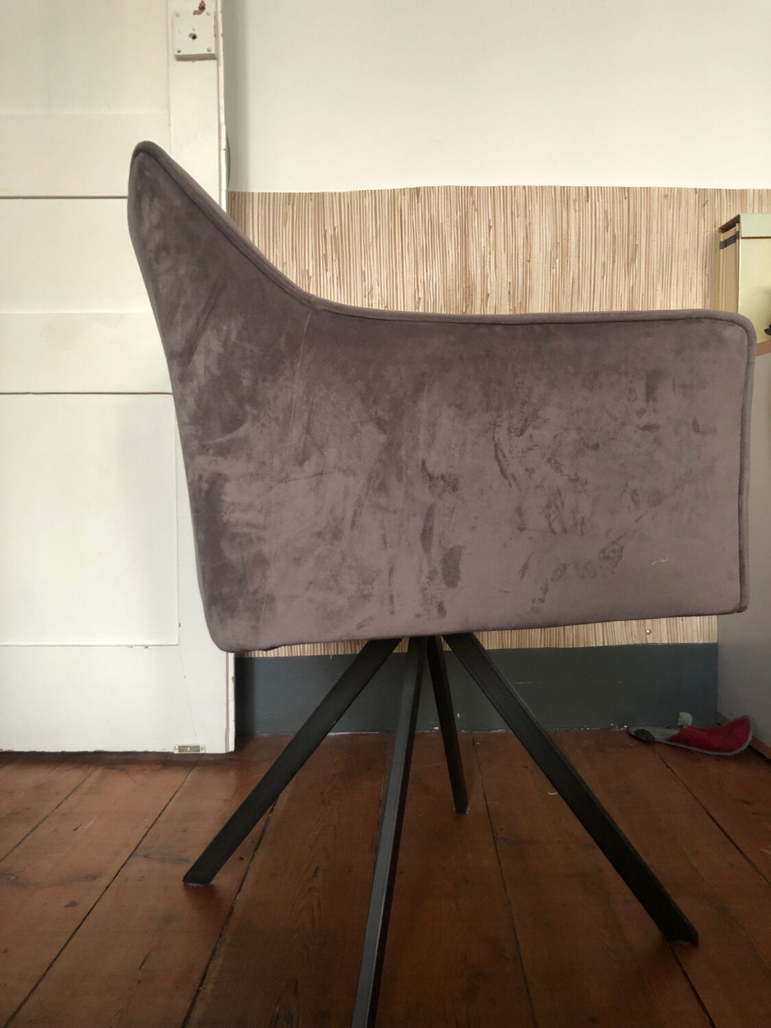 Grey fabric swivel chair in industrial style