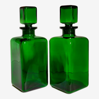Duo of vintage green glass decanter bottles