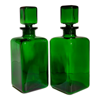 Duo of vintage green glass decanter bottles