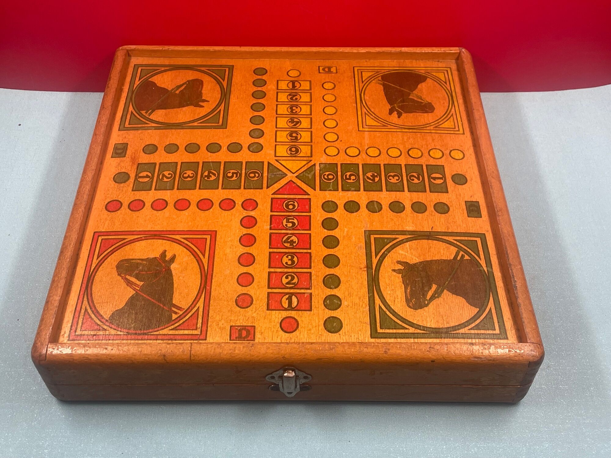 old wooden checkers' box, goose game, dada horses and jacquet with pawns. collectible game