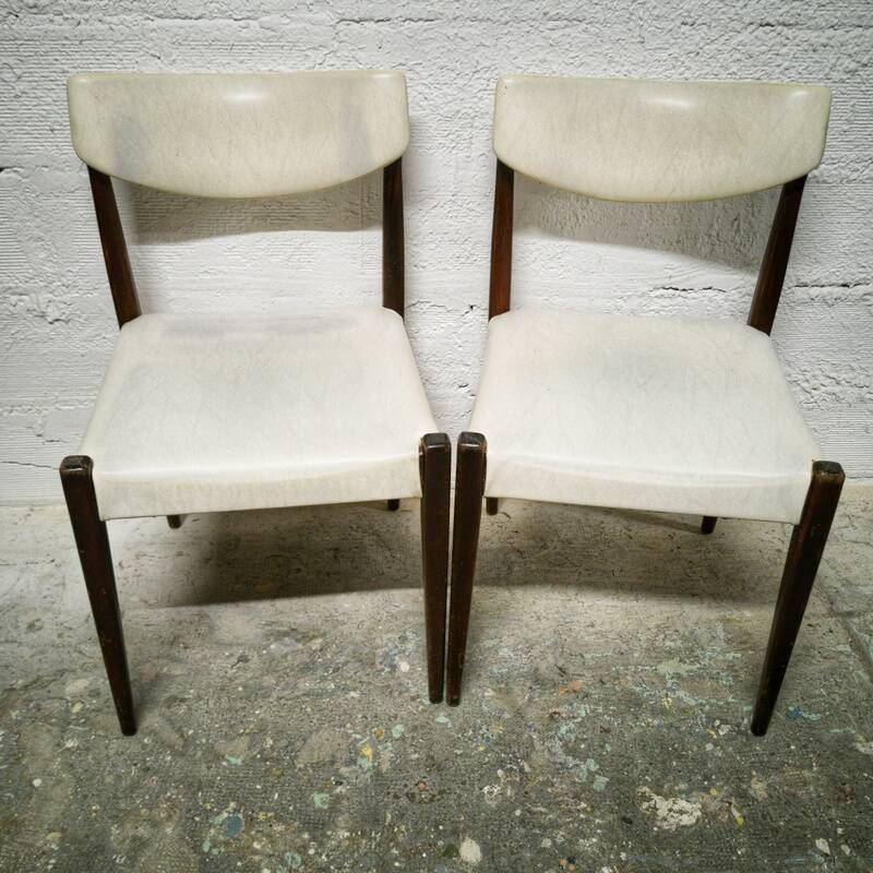 Pair of vintage teak and skai chairs
