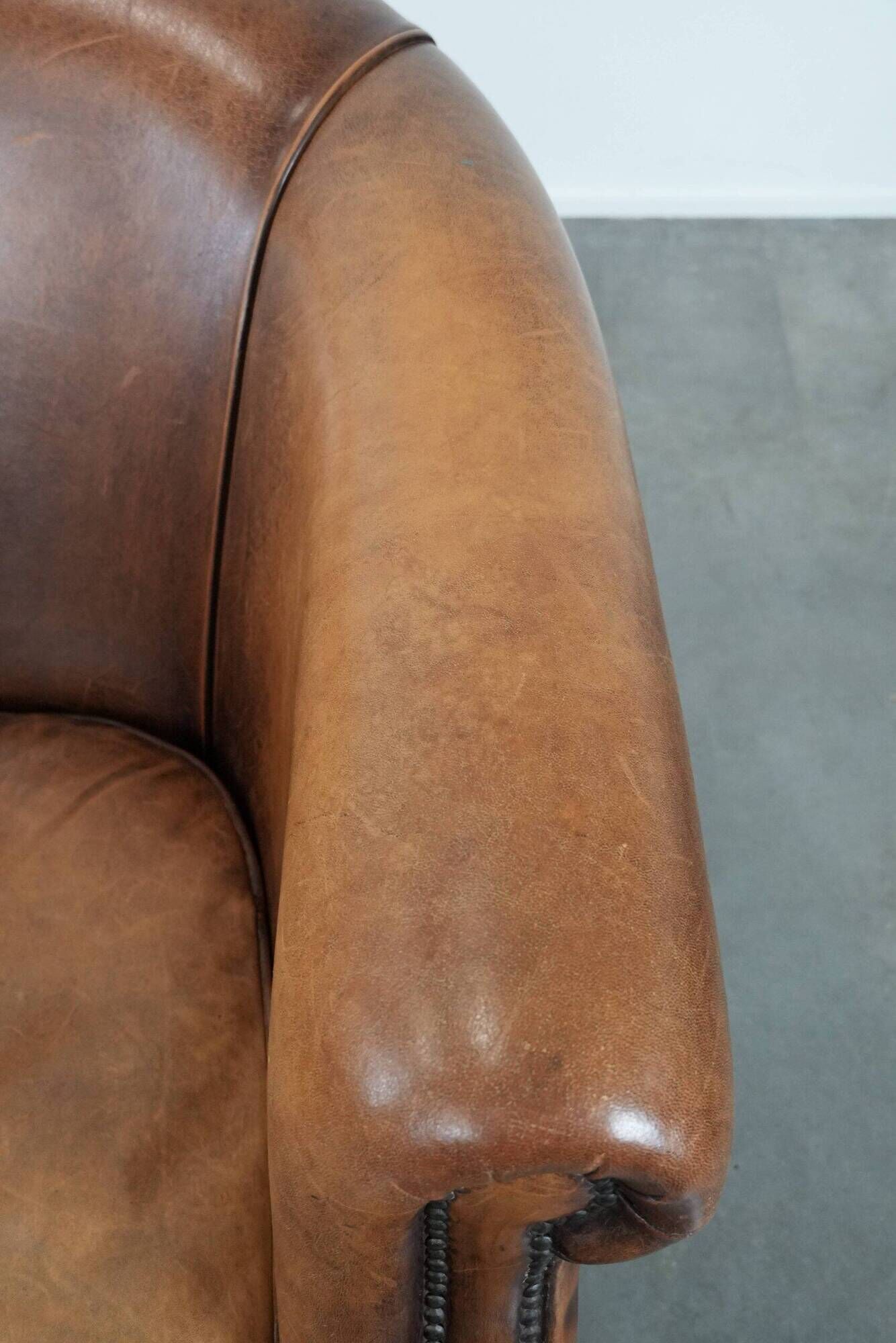 Comfortable club chair made of sheepskin leather