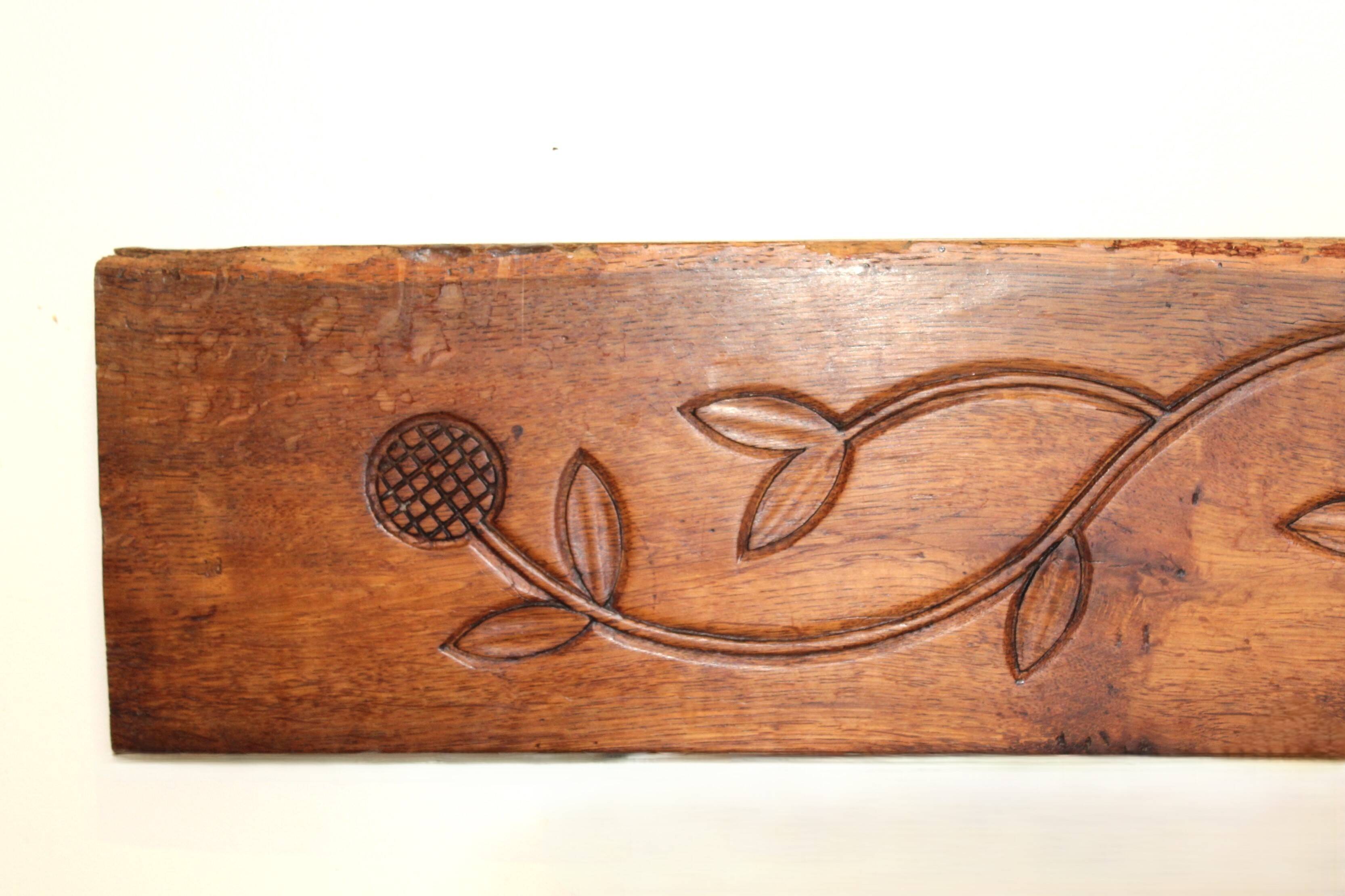 Antique carved wooden decorative panel