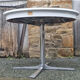 Round table in white formica, retractable, vintage, Collomb creation, 70s