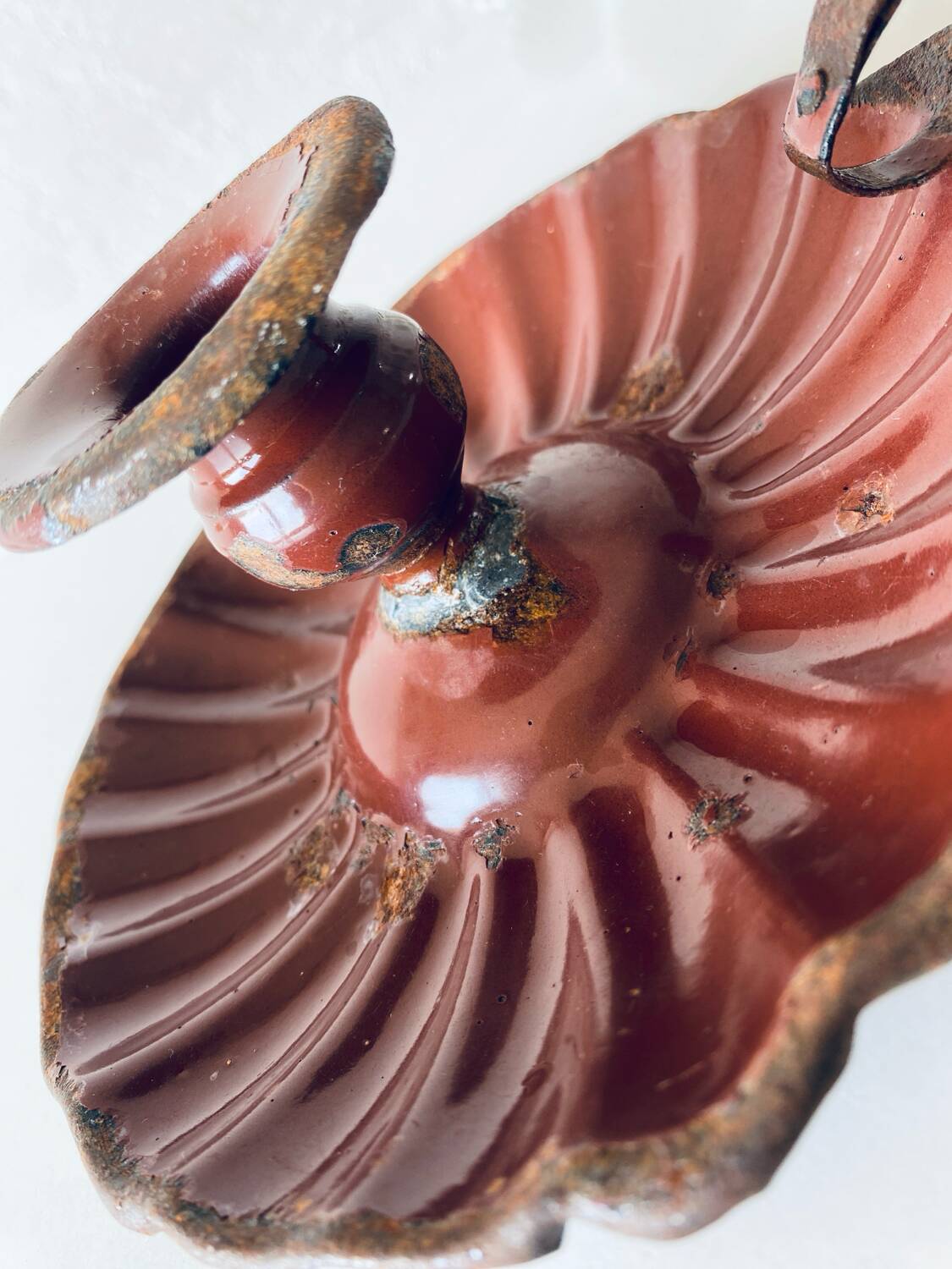 Antique enamelled candle holder