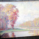 Huile sur toile, représentant un bord de rivière, signé et daté 1938