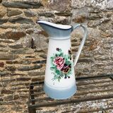 Enamelled broc with floral decoration