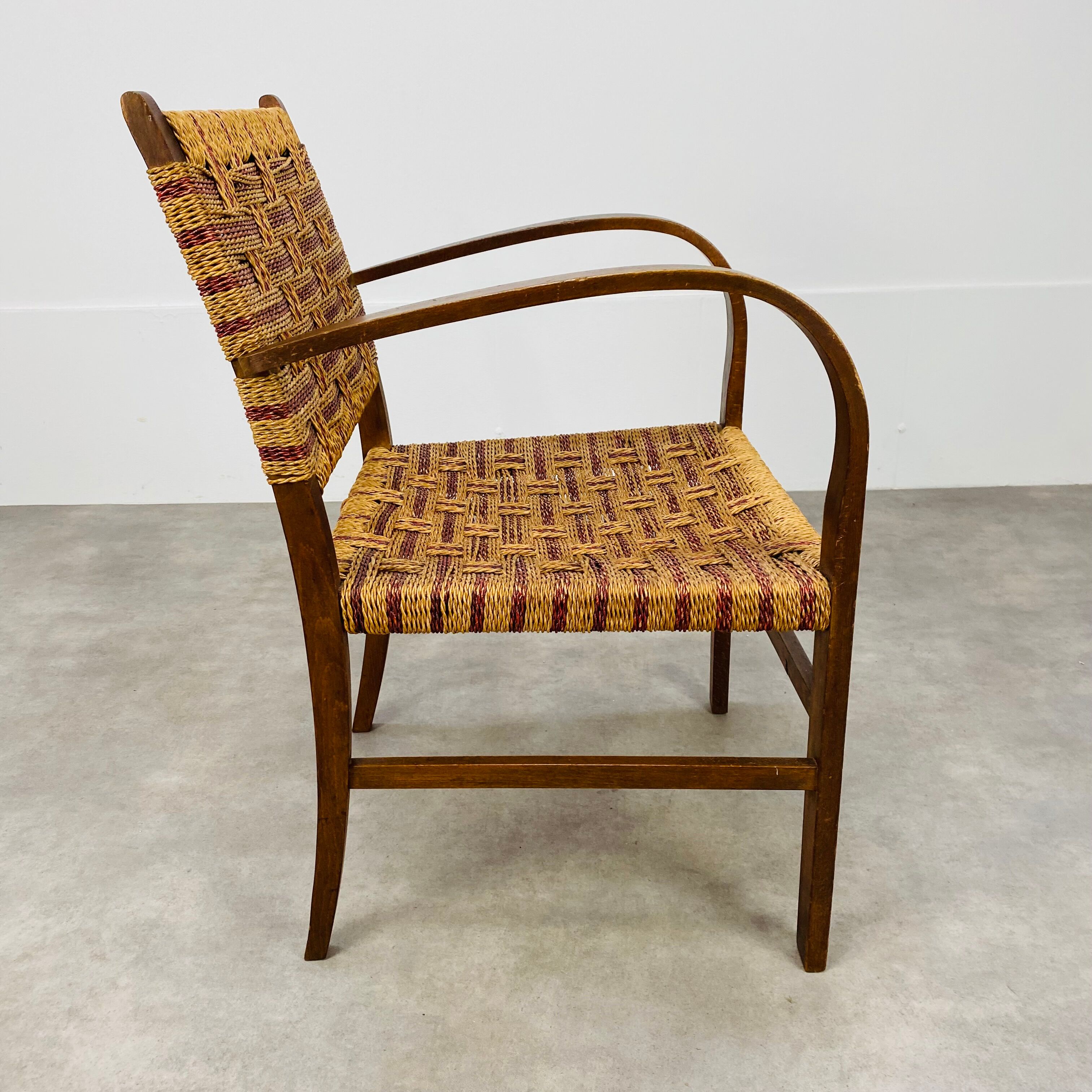 Scandinavian armchair in wood and vintage straw rope
