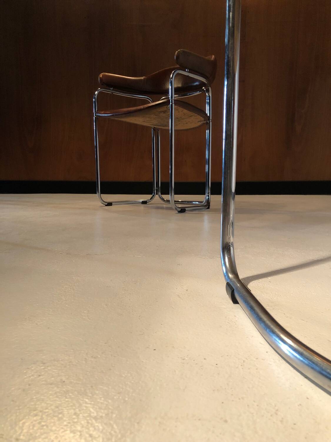 Pair of vintage armchairs, cognac leather and chrome steel 1970