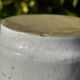 Pretty pot or vase in glazed stoneware with blue drip effect.