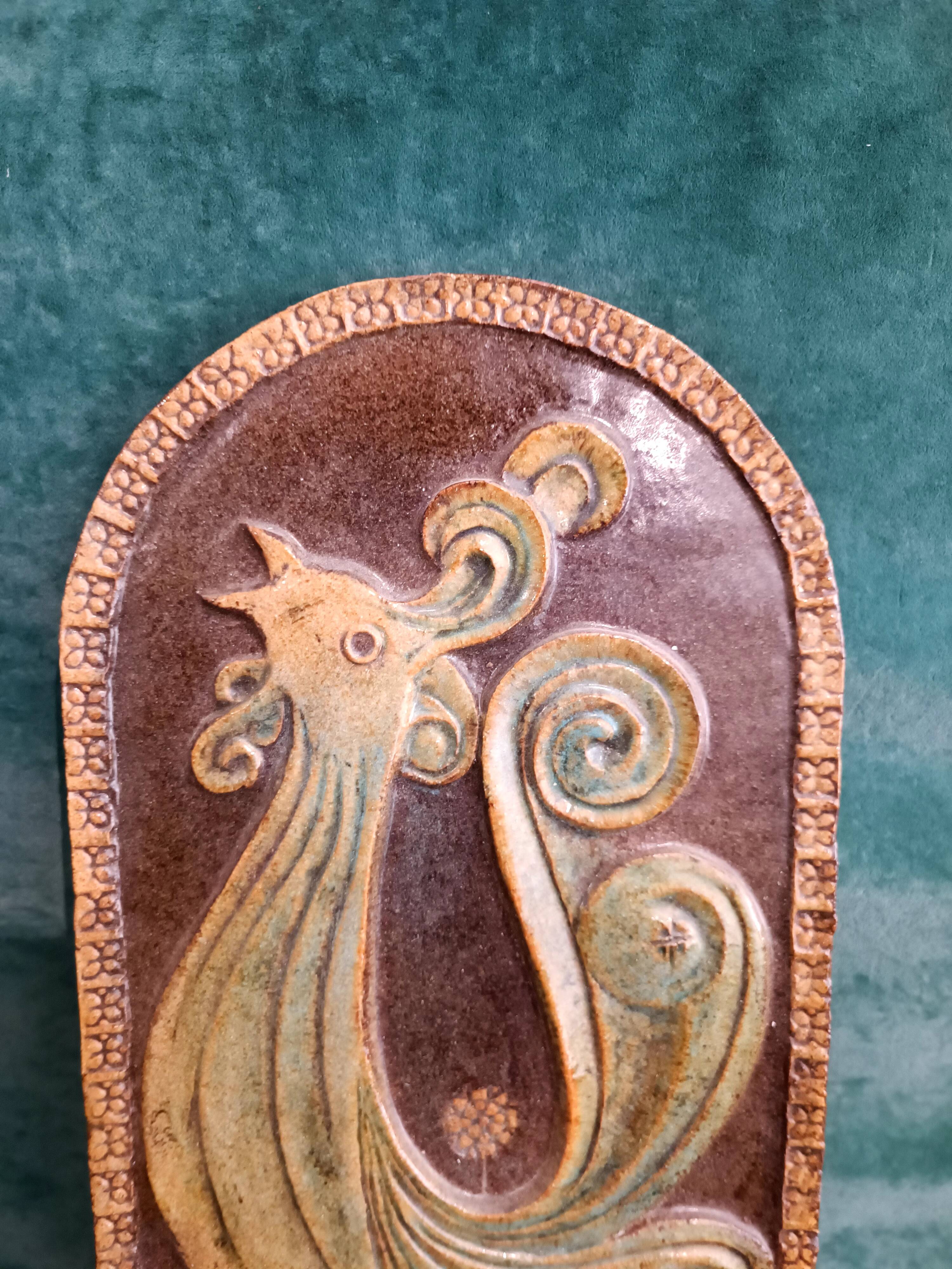 Art pottery with a rooster