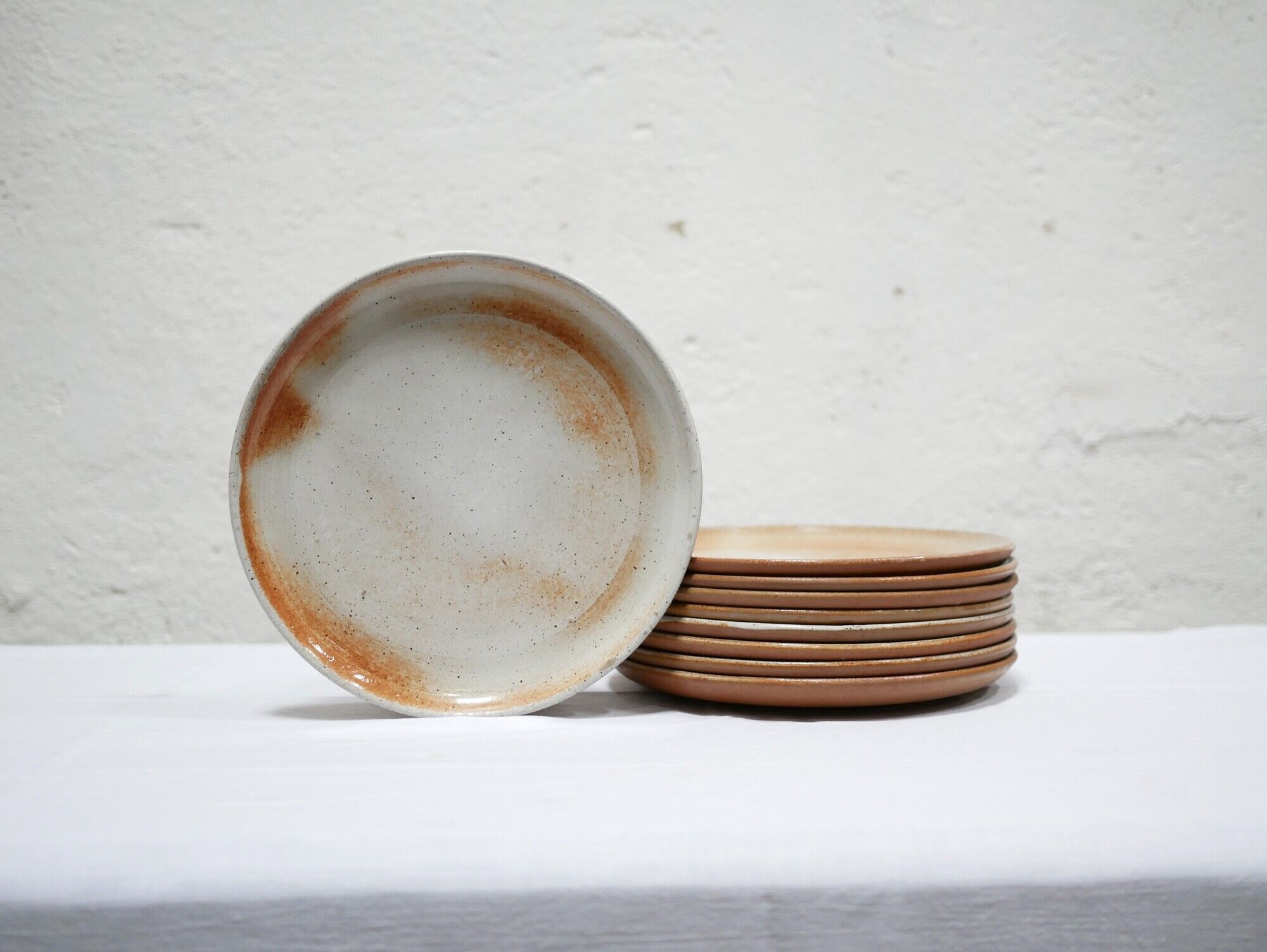 Series of 9 vintage stoneware plates by Les Poteries du Marais, France