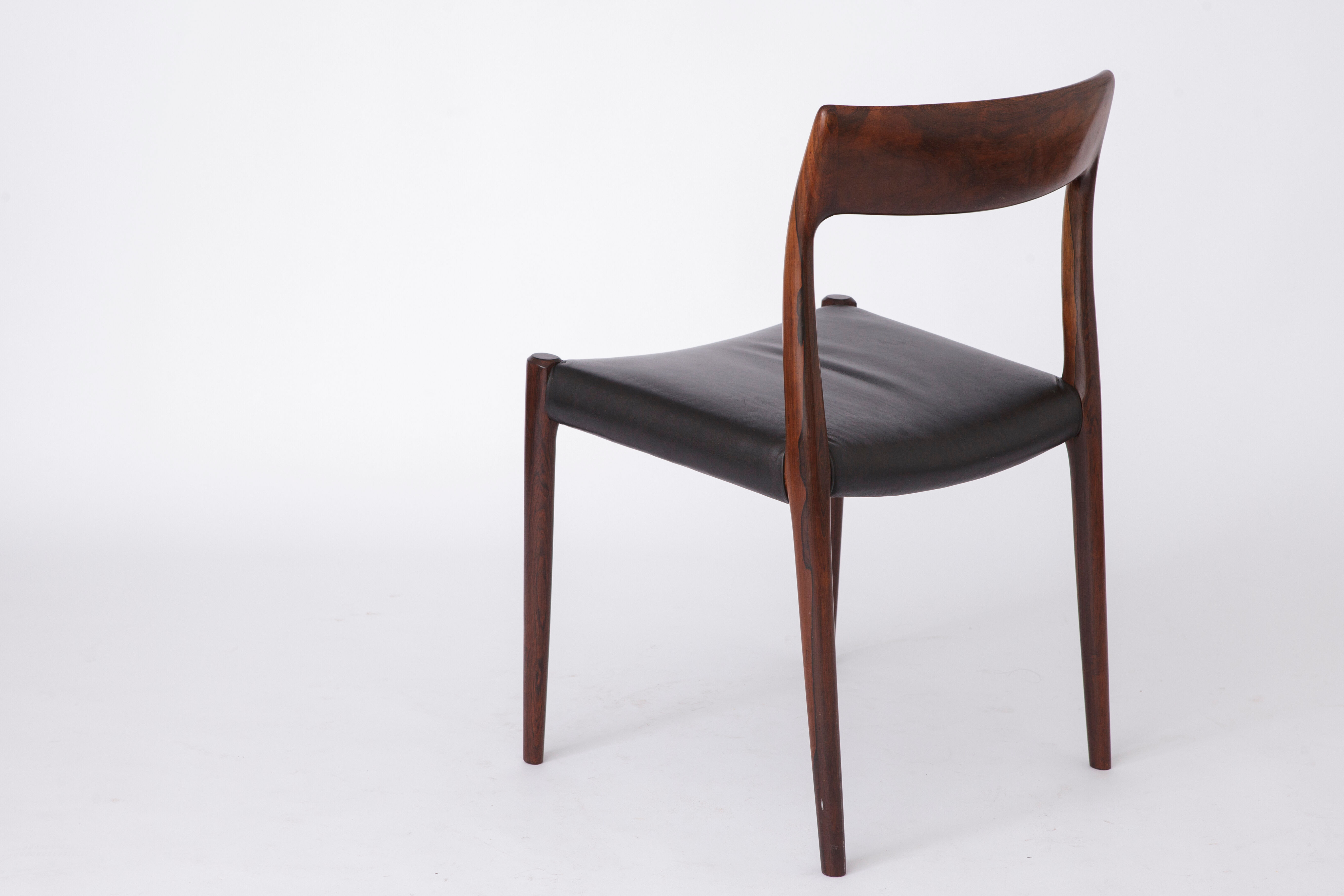 Mid century Rosewood dining chair with leather seat by Niels O. Møller for J.L. Moller