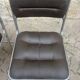 Four vintage chairs from the 1960s and 1970s, chrome with faux leather.