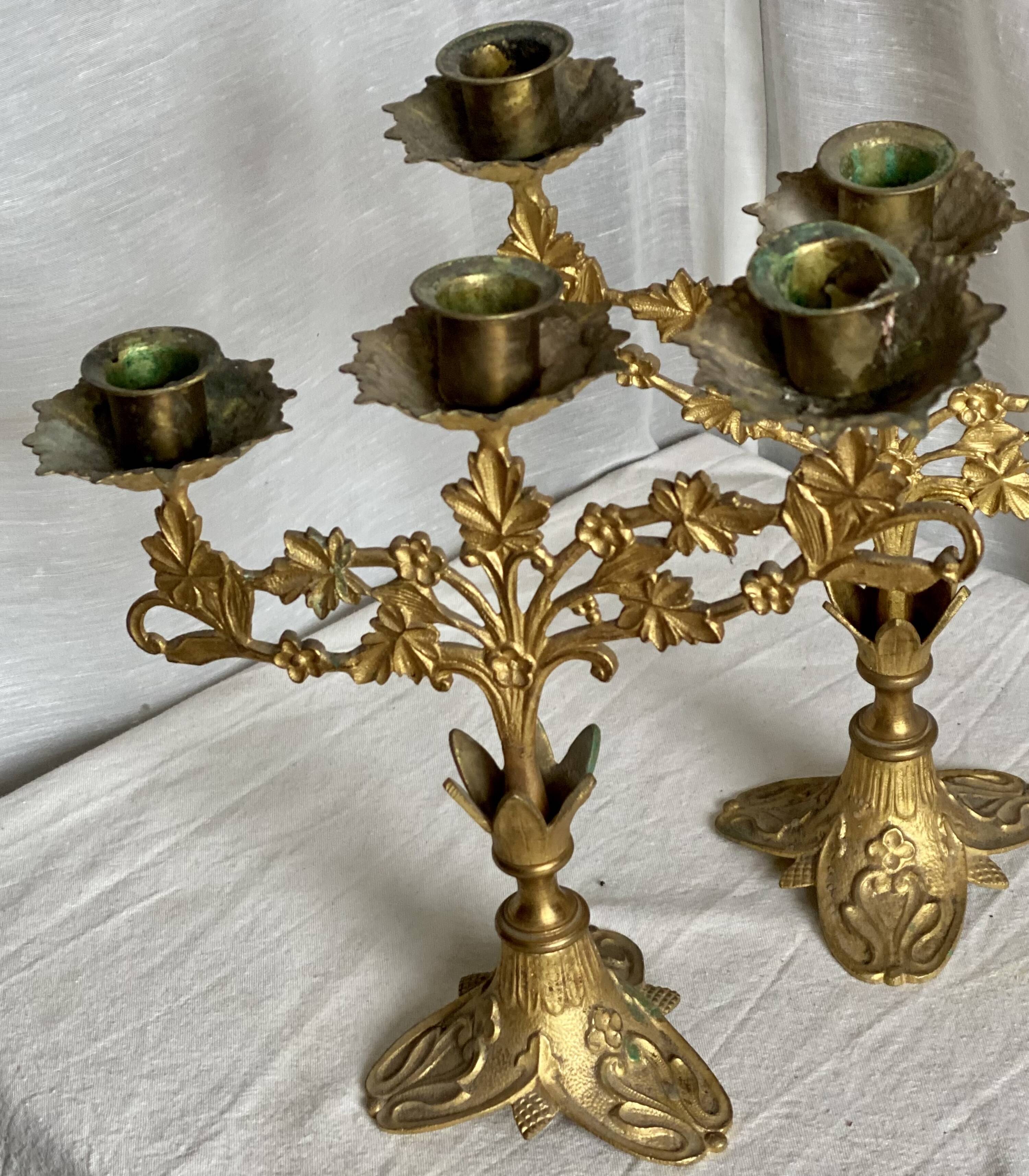 Set of 3 gilt metal candlesticks from the early 20th century.
